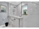 Spa-like bathroom with walk-in shower and marble tile at 150 Sage Rd, Crystal Beach, FL 34681