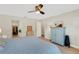 Main bedroom with walk-in closet and ceiling fan at 22 Penzance Ct, Safety Harbor, FL 34695
