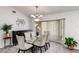 Elegant dining room with a glass table and modern chairs at 2250 Rio De Janeiro Ave, Punta Gorda, FL 33983