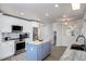 Modern kitchen with stainless steel appliances and island at 2250 Rio De Janeiro Ave, Punta Gorda, FL 33983