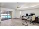 Home office with pool view, desk, and two computer monitors at 2250 Rio De Janeiro Ave, Punta Gorda, FL 33983