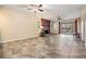 Bright living room with tile floors, fireplace, and sliding glass doors leading to a view at 232 Caryl Way # 232, Oldsmar, FL 34677