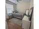 Cozy guest bedroom with a full-size bed and plenty of natural light at 23917 Pow Wow Dr, Lutz, FL 33559