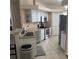 Modern kitchen with stainless steel appliances and ample counter space at 23917 Pow Wow Dr, Lutz, FL 33559