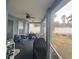 Spacious screened porch, perfect for relaxing and grilling at 23917 Pow Wow Dr, Lutz, FL 33559