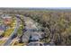 Aerial view of homes and landscape in neighborhood at 26722 Winged Elm Dr, Wesley Chapel, FL 33544