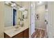 Bathroom with vanity, sink, and shower at 26722 Winged Elm Dr, Wesley Chapel, FL 33544