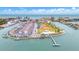 Aerial view showing community's location near beach and waterways at 320 Medallion Blvd # D, Madeira Beach, FL 33708