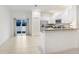 Modern kitchen with stainless steel appliances and granite countertops at 36401 Camp Fire Ter, Zephyrhills, FL 33541