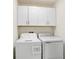 Convenient laundry room with washer and dryer at 36401 Camp Fire Ter, Zephyrhills, FL 33541