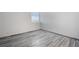 Simple bedroom with tile floors and window at 4015 Bayshore Blvd # 10C, Tampa, FL 33611