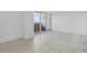 Bright living room with tile floors and balcony access at 4015 Bayshore Blvd # 10C, Tampa, FL 33611