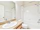 Bathroom with shower/tub combo, toilet, and vanity at 4207 Key Thatch Dr, Tampa, FL 33610
