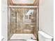 Bathroom with walk-in shower and tile surround at 4207 Key Thatch Dr, Tampa, FL 33610