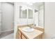 Clean bathroom with a vanity, sink, and mirror at 4207 Key Thatch Dr, Tampa, FL 33610