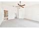 Bedroom with ceiling fan, ensuite bathroom access, and walk-in closet at 4207 Key Thatch Dr, Tampa, FL 33610