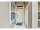 Townhome entry with white door and window at 4207 Key Thatch Dr, Tampa, FL 33610
