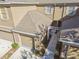 Tan townhome building with attached garage and walkway at 4207 Key Thatch Dr, Tampa, FL 33610