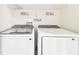 Laundry room with Samsung washer and dryer at 4207 Key Thatch Dr, Tampa, FL 33610