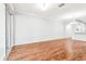 Open living room with hardwood floors and access to kitchen at 4207 Key Thatch Dr, Tampa, FL 33610
