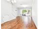 Spacious living room with hardwood floors and sliding glass doors at 4207 Key Thatch Dr, Tampa, FL 33610