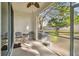 Screened-in patio overlooking the backyard at 4207 Key Thatch Dr, Tampa, FL 33610