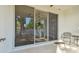 Screened-in patio with sliding glass doors and outdoor furniture at 4207 Key Thatch Dr, Tampa, FL 33610