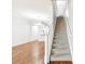 Elegant staircase with white railing and carpeted steps at 4207 Key Thatch Dr, Tampa, FL 33610