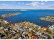 Wide aerial view of waterfront homes and neighborhood at 4235 Moody St, St Pete Beach, FL 33706