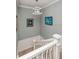 Elegant staircase with decorative railing and lighting at 4319 Harbor House Dr # 4319, Tampa, FL 33615