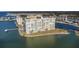 Aerial view of waterfront condo building with private peninsula at 4775 Cove Cir # 802, St Petersburg, FL 33708