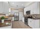 Modern kitchen featuring stainless steel appliances and granite countertops at 4936 Sandy Brook Cir, Wimauma, FL 33598
