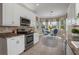 Eat-in kitchen with stainless steel appliances and a breakfast nook at 4936 Sandy Brook Cir, Wimauma, FL 33598