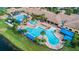 Resort-style pool with lap lanes, spa, and multiple lounging areas at 5004 Sandy Brook Cir, Wimauma, FL 33598