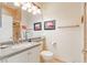 Clean bathroom with single vanity and shower/tub combo at 5004 Sandy Brook Cir, Wimauma, FL 33598