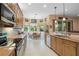 Well-equipped kitchen with breakfast nook and ample counter space at 5004 Sandy Brook Cir, Wimauma, FL 33598