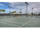 Well-maintained tennis courts with ample lighting at 5004 Sandy Brook Cir, Wimauma, FL 33598
