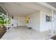 Covered carport area next to the house entrance at 51 Lexington Dr, Dunedin, FL 34698