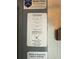 Indoor electrical panel with inspection stickers at 51 Lexington Dr, Dunedin, FL 34698