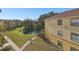 Arial view of a community with pond and walkways at 5612 Pinnacle Heights Cir # 304, Tampa, FL 33624