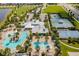 Community features include a pool, a splash pad, tennis courts and a clubhouse at 6032 Milestone Dr, Apollo Beach, FL 33572