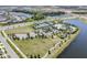 Expansive community with a lake, recreation center and tennis courts at 6032 Milestone Dr, Apollo Beach, FL 33572