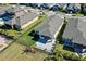 Aerial view of a house with a fenced backyard and patio at 6232 Sea Air Dr, Apollo Beach, FL 33572