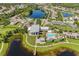 Aerial view of community amenities including pool, playground, and clubhouse at 6232 Sea Air Dr, Apollo Beach, FL 33572