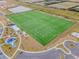 Aerial view showing sports fields, playground, and parking at 6232 Sea Air Dr, Apollo Beach, FL 33572