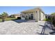 House exterior showcasing backyard patio with outdoor kitchen at 6232 Sea Air Dr, Apollo Beach, FL 33572