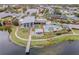 Aerial view of community pool and clubhouse near a lake at 6232 Sea Air Dr, Apollo Beach, FL 33572