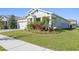 House exterior showcasing landscaping and a paved driveway at 6232 Sea Air Dr, Apollo Beach, FL 33572