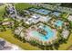 Community pool with water features and surrounding lounge area at 6232 Sea Air Dr, Apollo Beach, FL 33572