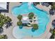 Aerial view of resort-style pool and water slide at 6232 Sea Air Dr, Apollo Beach, FL 33572